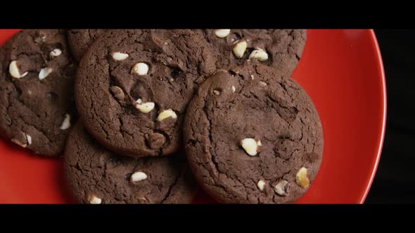 Cinematic, Rotating Shot of Cookies on a Plate  alt