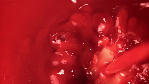 Super Slow Motion Tomato Juice Pours with Air Bubbles alt