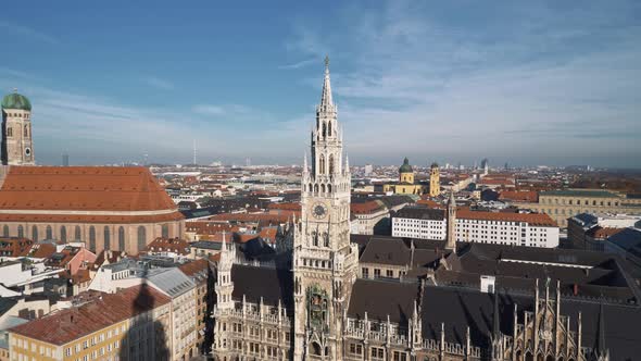Aerial View of Church of Our Lady and New Town Hall. Right To Left Pan Real Time Establishing Shot alt