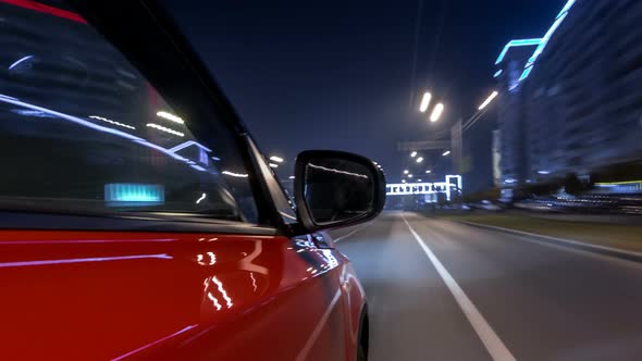Drivelapse Urban Look From Fast Driving Car at a Night Avenue in a City Timelapse Hyperlapse alt