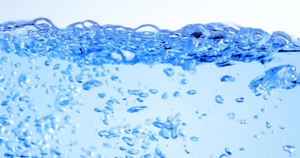 Many Bubbles in Water Close Up Abstract Water Wave with Bubbles in Slow Motion alt