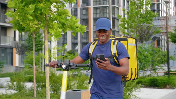 Happy African Deliveryman Worker Employee Deliver Online Order Client alt