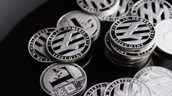 Rotating shot of Bitcoins (digital cryptocurrency) - BITCOIN LITECOIN 371 alt