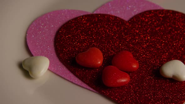 Rotating stock footage shot of Valentines decorations and candies - VALENTINES 0099 alt