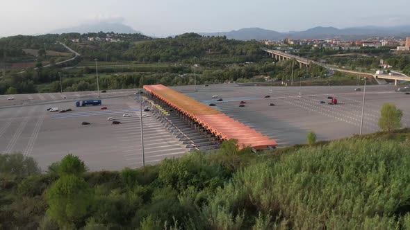 Aerial Hyperlapse Over Toll Booth At Martorell Motorway In Barcelona. Circle Dolly alt