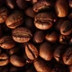 Coffee beans close-up top view circular rotation. Flat lay of roasted coffee - VideoHive Item for Sale