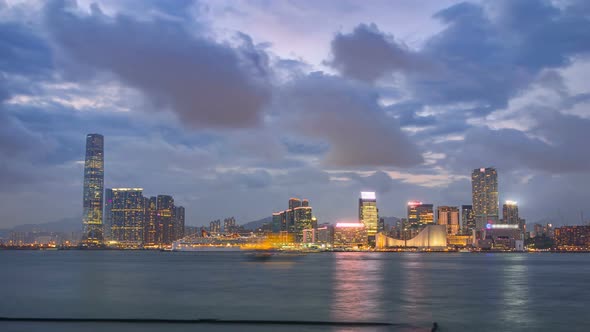 Shyline Panorama Timelapse Day To Night with International Commerce Centre in West Kowloon Hong Kong alt