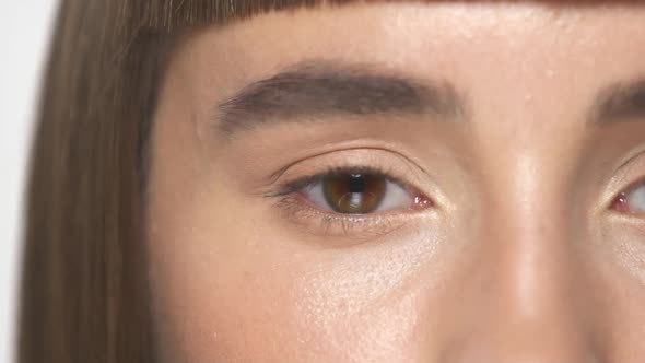 Beautiful Brown Eyes of Woman alt