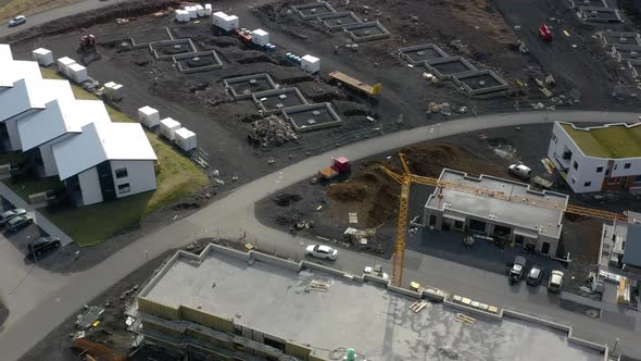 Bird's-Eye View Of The Constructed Establishments, Housing, Installed Tower Cranes And Vehicles In R alt