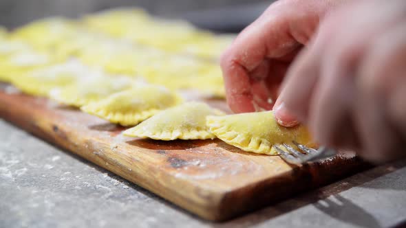 Preparing traditional italian ravioli. Homemade italian pasta. Homemade ravioli.