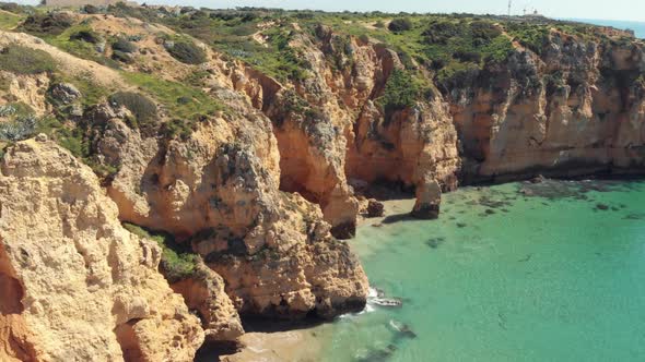 Idyllic golden Lagos coast washed by Algarve stunning warm sea, Portugal alt