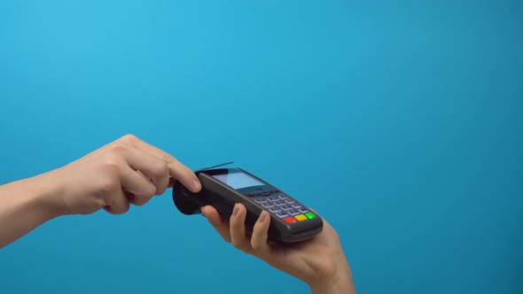 Making Payment with Credit Card Machine Bank Transaction on Color Background