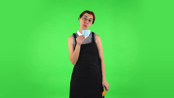 Funny Girl Is Holding Paper Stick Expressing Awful Mood Then Taking Another Expressing Good Mood alt