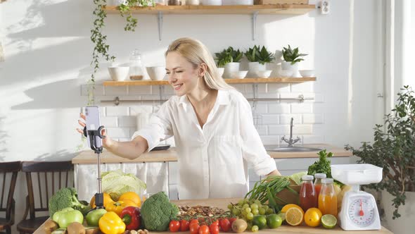 Female Nutritionist Keeps a Video Blog on Her Mobile Phone Talks About Proper Healthy Nutrition alt
