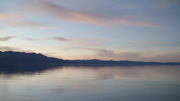 Beautiful View of Lake Tahoe at Dusk with Colorful Reflection of Clouds