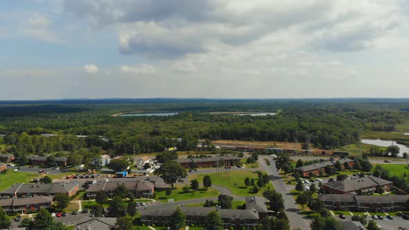 View of Small Town Neighborhood with Landscape Roofs of Houses alt