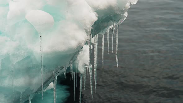 Icicles On Iceberg Over Sea alt