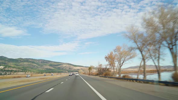 POV View Through Window Driving Route 395 California on Beautiful Day