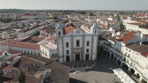 Aerial panoramic view of cityscape with Sant'Antonio church in foreground. Evora. Portugal