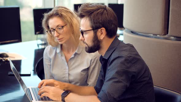 Two Colleague Talking In Office Job.Successful Leader Problem Solving  In Office.Modern Workplace. alt