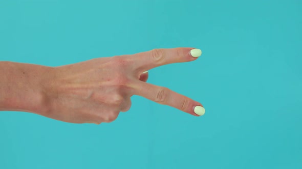 Woman Hand Show Rock Paper Scissors Game alt