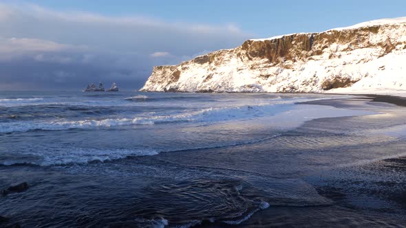 Iceland Vik Black Sand Beach View of Ocean and Basalt Rock Formations