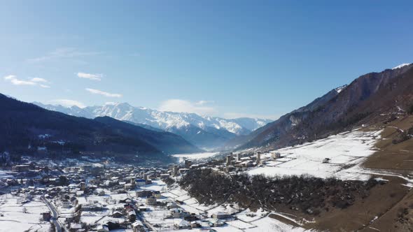 Towers and Snowy Mountains in Old City Mestia, Georgia