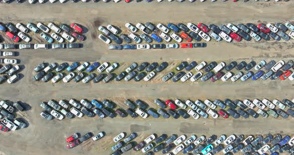Aerial View of Auto Auction Many Used Car Lot Parked Distributed in a Parking alt