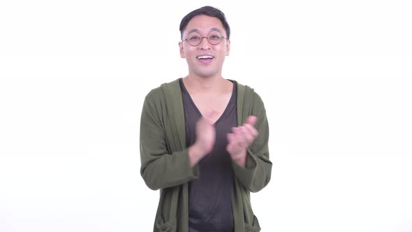 Happy Japanese Man with Eyeglasses Clapping Hands alt