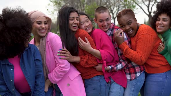 Happy multiracial women having fun together outdoor - Beautiful diverse female friends