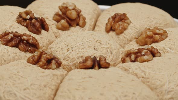 Sweet Turkish Dessert Halva Block with Nuts Closeup