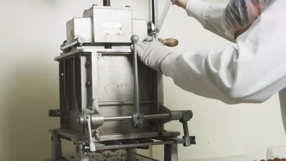 Making chocolate truffles in a candy factory