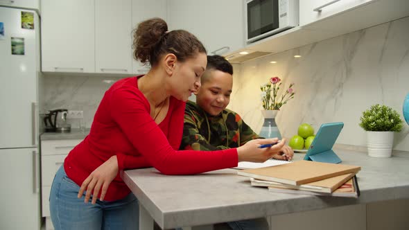 Annoyed Mother Son Experiencing Learning Difficulty of Homeschooling alt