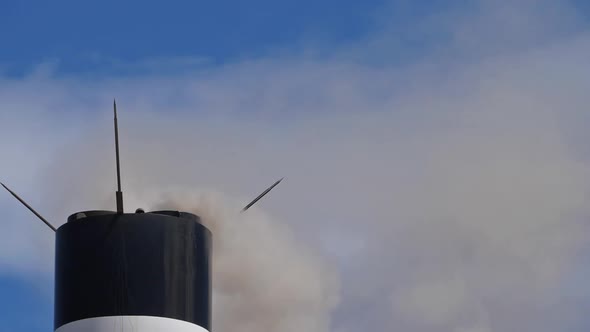 Smoke and air pollution from a chimney in France. alt