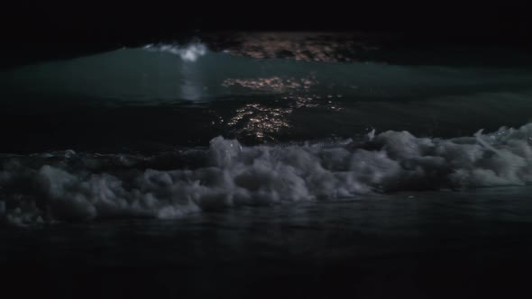 Scene of the Sea Washing Shore at Night alt