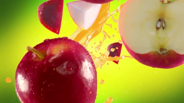 Red Apple with Slices Falling on Lime Green Background alt