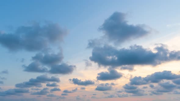 day to night time lapse of cloud and sky at sunset alt