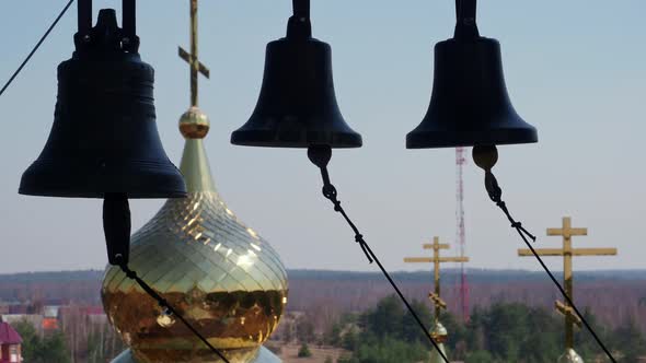 Many Ringing Church Bells in the Church Bell Tower