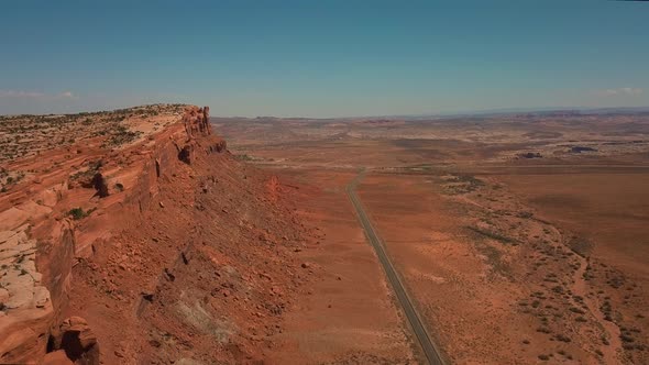 Drone View of Road in Desert with Traffic Near Moab