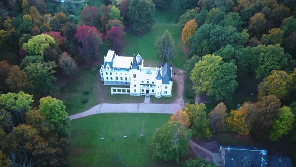 Stameriena Palace, Stameriena Lake at Sunset Aerial View in Autumn, Orthodox Church in Background. alt