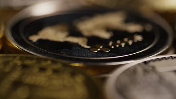 Rotating shot of Bitcoins  alt