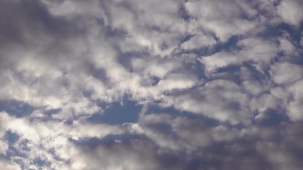 Puffy Smoky Spring Rain Clouds alt