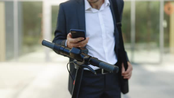 Businessman Take Rent Electric Kick Scooter NFC Contactless Locker Phone Application alt