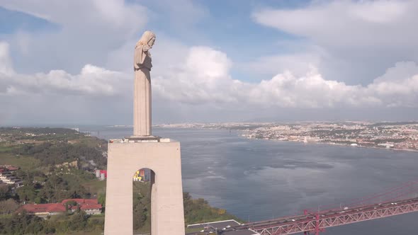 Aerial of Christ the King statue on Tagus riverside