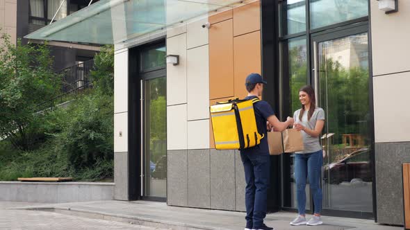 Positive Food Delivery Man Courier with Thermal Backpack Deliver Order Woman alt