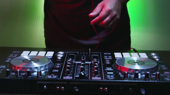 Man of DJ Tweak Various Track Controls on DJ Deck 31