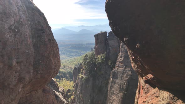 Canyon with Belogradchik group of rocks 4K 2160p 30fps UltraHD footage - Natural stone formations in alt