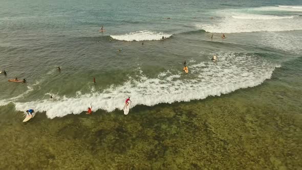 Surfers on the Water Surface alt