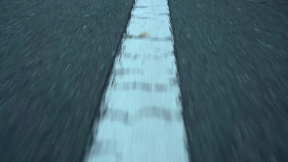 Chasing man in black walking alt