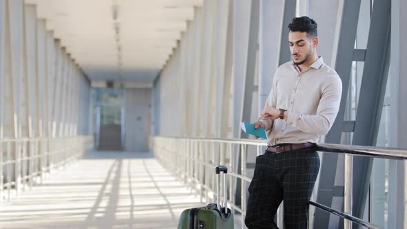 Successful Professional Hispanic Handsome Man Guy Tourist Passenger Businessman Stands in Airport alt